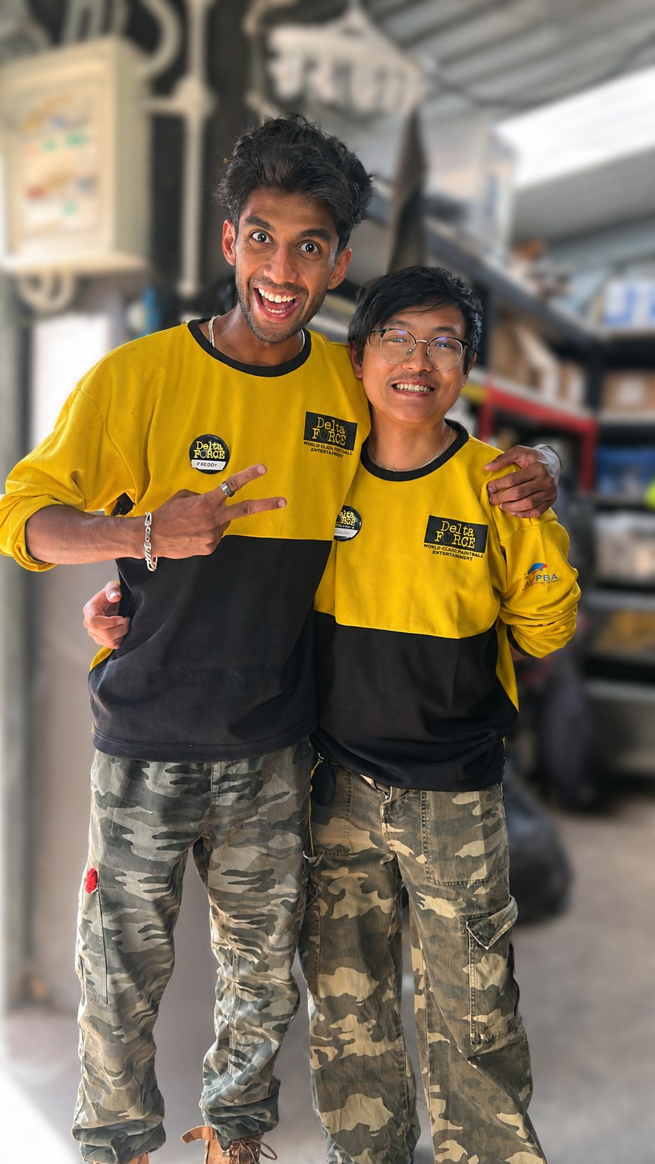 Two smiling Delta Force marshals standing together in uniform